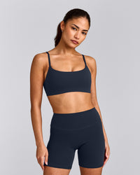 SoftMotion™ Strappy Sports Bra with Gray Logo | True Blue