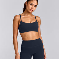 SoftMotion™ Strappy Sports Bra with Gray Logo | True Blue
