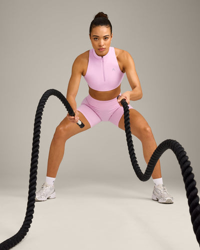 EasyLift™ Zip High Neck Sports Bra with Grey Logo | Chalk Pink