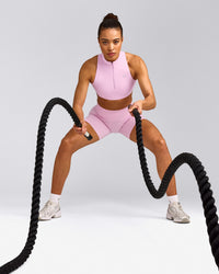 EasyLift™ Zip High Neck Sports Bra with Gray Logo | Chalk Pink