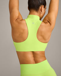 EasyLift™ Zip High Neck Sports Bra with Gray Logo | Citrus Green