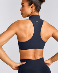 EasyLift™ Zip High Neck Sports Bra with Gray Logo | True Blue