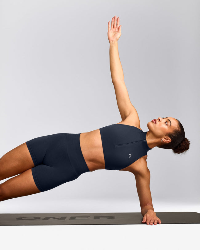 EasyLift™ Zip High Neck Sports Bra with Gray Logo | True Blue