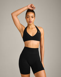 EffortlessLift™ Seamless Halter Neck Sports Bra with Gray Logo | Black