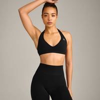 EffortlessLift™ Seamless Halter Neck Sports Bra with Gray Logo | Black