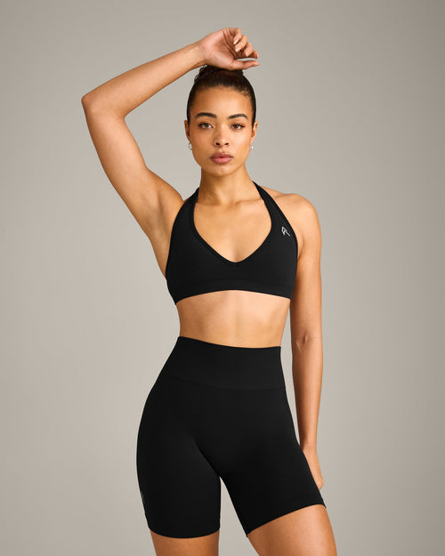 EffortlessLift™ Seamless Halter Neck Sports Bra with Gray Logo | Black
