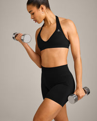 EffortlessLift™ Seamless Halter Neck Sports Bra with Gray Logo | Black
