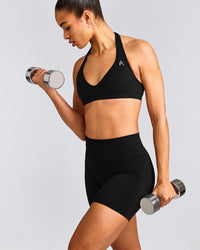EffortlessLift™ Seamless Halter Neck Sports Bra with Gray Logo | Black