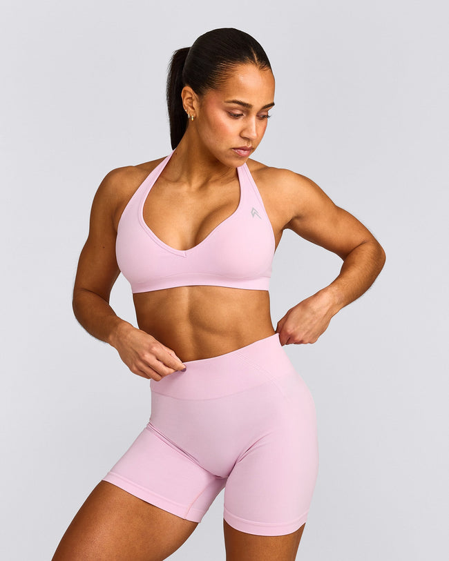 EffortlessLift™ Seamless Halter Neck Sports Bra with Gray Logo | Chalk Pink