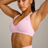 EffortlessLift™ Seamless Halter Neck Sports Bra with Gray Logo | Chalk Pink