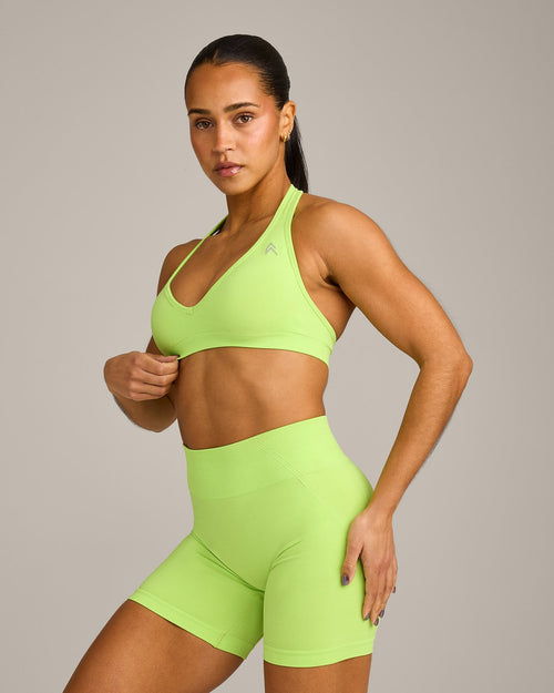 Oner Modal EffortlessLift™ Seamless Halter Neck Sports Bra with Gray Logo | Citrus Green