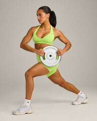 EffortlessLift™ Seamless Halter Neck Sports Bra with Gray Logo | Citrus Green