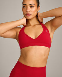 EffortlessLift™ Seamless Halter Neck Sports Bra with Gray Logo | Fiery Red