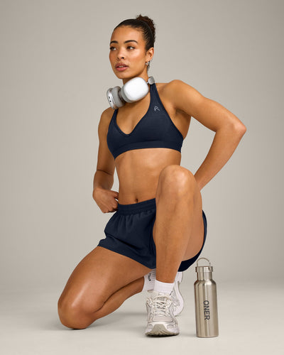 EffortlessLift™ Seamless Halter Neck Sports Bra with Gray Logo | True Blue