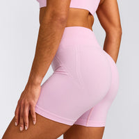 EffortlessLift™ Seamless Mid Rise Shorts with Gray Logo | Chalk Pink