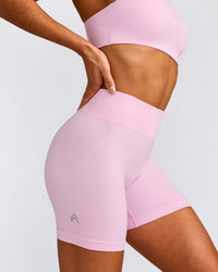 EffortlessLift™ Seamless Mid Rise Shorts with Gray Logo | Chalk Pink