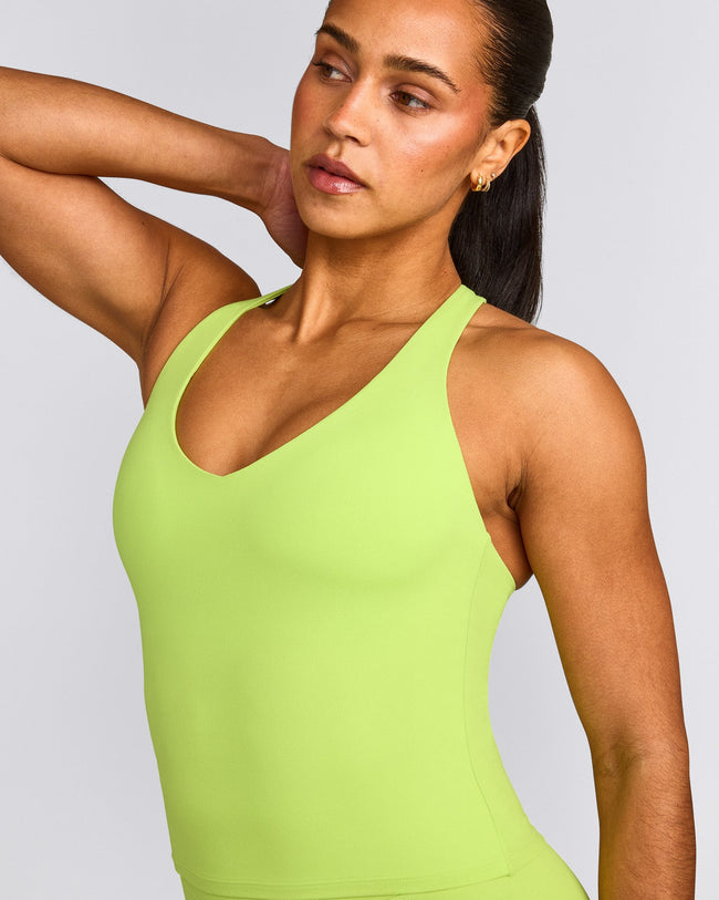 SoftMotion™ Racer Back Mid Tank Top with Built in Bra Shelf with Gray Logo | Citrus Green