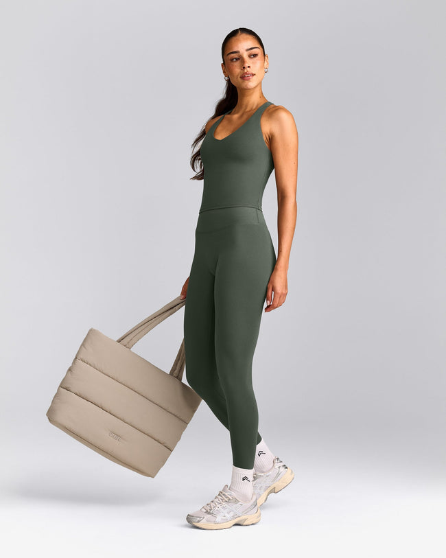 SoftMotion™ Racer Back Mid Tank Top with Built in Bra Shelf with Gray Logo | Dark Khaki