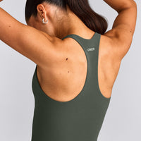 SoftMotion™ Racer Back Mid Tank Top with Built in Bra Shelf with Gray Logo | Dark Khaki