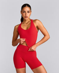 SoftMotion™ Racer Back Mid Tank Top with Built in Bra Shelf with Gray Logo | Fiery Red