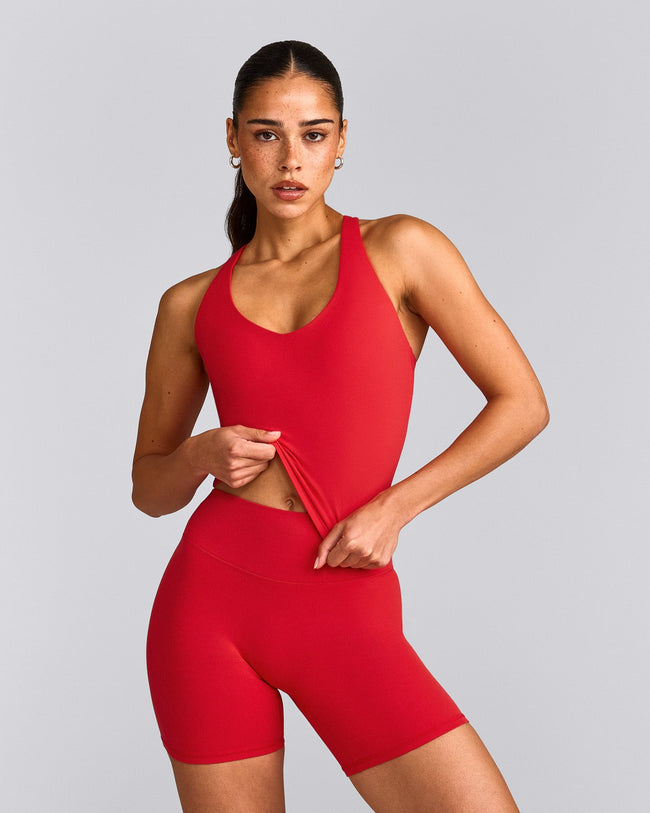 SoftMotion™ Racer Back Mid Tank Top with Built in Bra Shelf with Gray Logo | Fiery Red