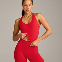 SoftMotion™ Racer Back Mid Vest with Built in Bra Shelf with Gray Logo | Fiery Red