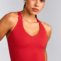 SoftMotion™ Racer Back Mid Tank Top with Built in Bra Shelf with Gray Logo | Fiery Red