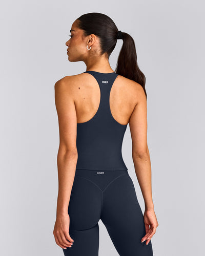 SoftMotion™ Racer Back Mid Tank Top with Built in Bra Shelf with Gray Logo | True Blue