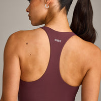 SoftMotion™ Racer Back Mid Vest with Built in Bra Shelf with Gray Logo | Velvet Mocha