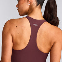 SoftMotion™ Racer Back Mid Tank Top with Built in Bra Shelf with Gray Logo | Velvet Mocha