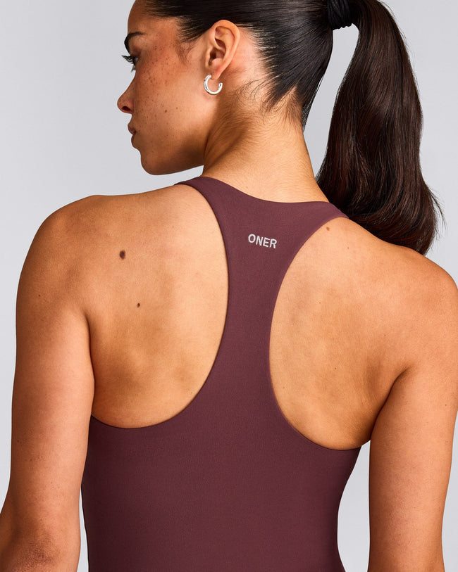 SoftMotion™ Racer Back Mid Tank Top with Built in Bra Shelf with Gray Logo | Velvet Mocha