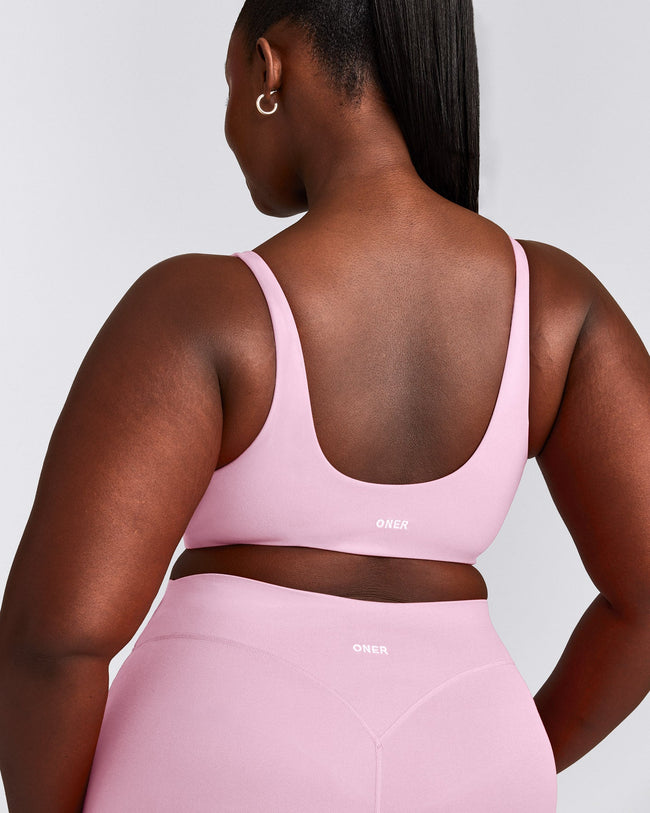 SoftMotion™ Scoop Back Bralette with Gray Logo | Chalk Pink