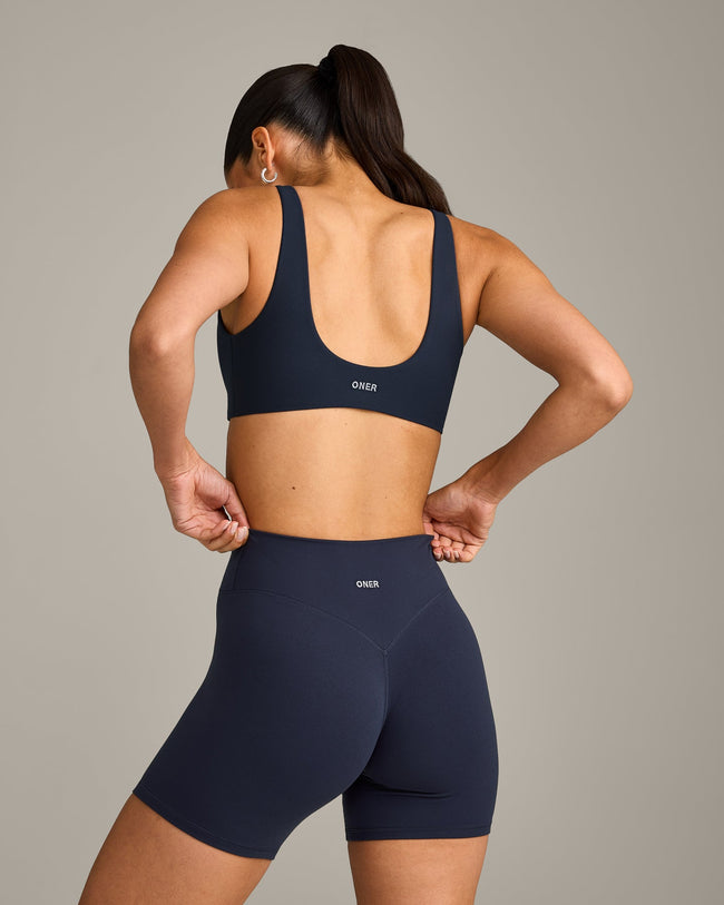 SoftMotion™ Scoop Back Bralette with Gray Logo | True Blue