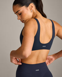 SoftMotion™ Scoop Back Bralette with Gray Logo | True Blue
