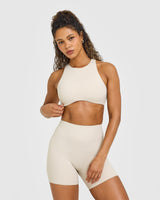 SoftMotion™ High Neck Sports Bra with White Logo | Sand