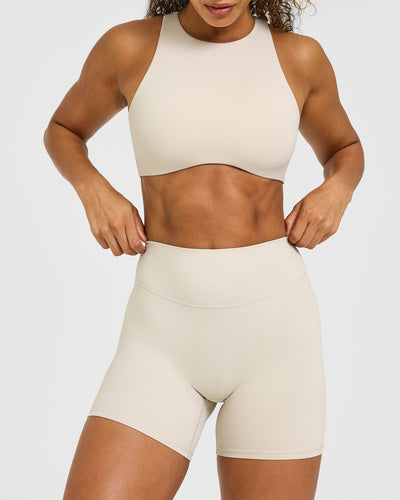 SoftMotion™ High Waisted Shorts 6" with White Logo | Sand