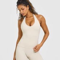 SoftMotion™ Halter Neck Vest with Built in Bra Shelf with White Logo | Sand