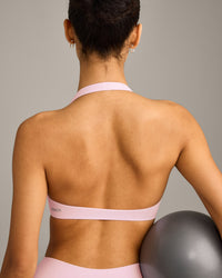 SoftMotion™ Minimal Halter Neck Bralette with Gray Logo | Soft Girl Pink