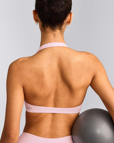SoftMotion™ Minimal Halter Neck Bralette with Gray Logo | Soft Girl Pink