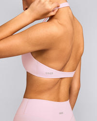 SoftMotion™ Minimal Halter Neck Bralette with Gray Logo | Soft Girl Pink