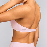 SoftMotion™ Minimal Halter Neck Bralette with Gray Logo | Soft Girl Pink