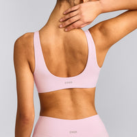SoftMotion™ Scoop Back Bralette with Gray Logo | Soft Girl Pink