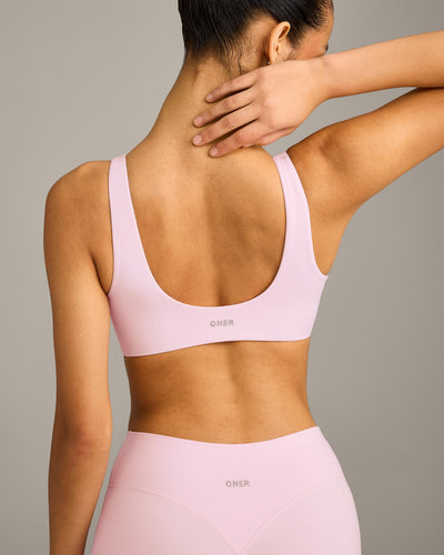 SoftMotion™ Scoop Back Bralette with Gray Logo | Soft Girl Pink