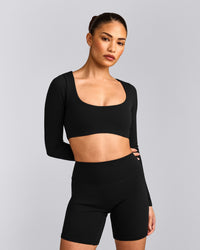 SoftMotion™ Scoop Neck Long Sleeve Crop Top with Built in Bra Shelf with Gray Logo | Black