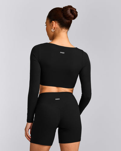 SoftMotion™ Scoop Neck Long Sleeve Crop Top with Built in Bra Shelf with Gray Logo | Black