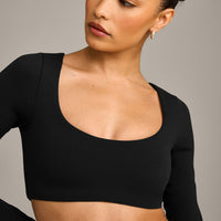 SoftMotion™ Scoop Neck Long Sleeve Crop Top with Built in Bra Shelf with Gray Logo | Black