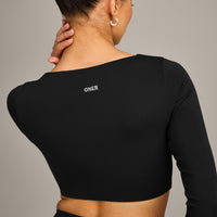 SoftMotion™ Scoop Neck Long Sleeve Crop Top with Built in Bra Shelf with Gray Logo | Black