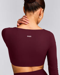 SoftMotion™ Scoop Neck Long Sleeve Crop Top with Built in Bra Shelf with Gray Logo | Cherry Lacquer Purple