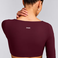 SoftMotion™ Scoop Neck Long Sleeve Crop Top with Built in Bra Shelf with Gray Logo | Cherry Lacquer Purple