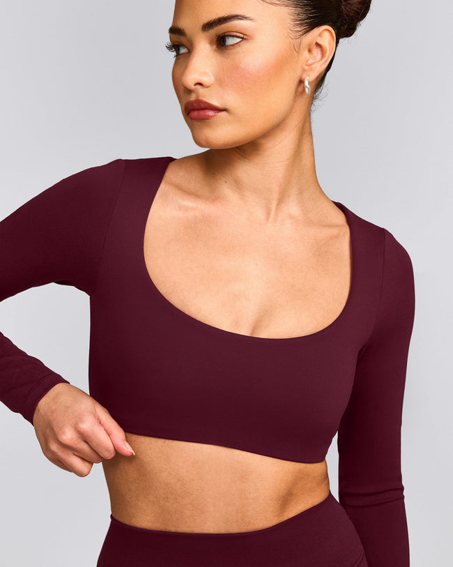 SoftMotion™ Scoop Neck Long Sleeve Crop Top with Built in Bra Shelf with Gray Logo | Cherry Lacquer Purple
